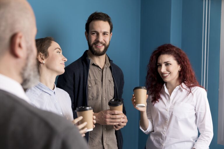 colleagues-enjoying-coffee-office
