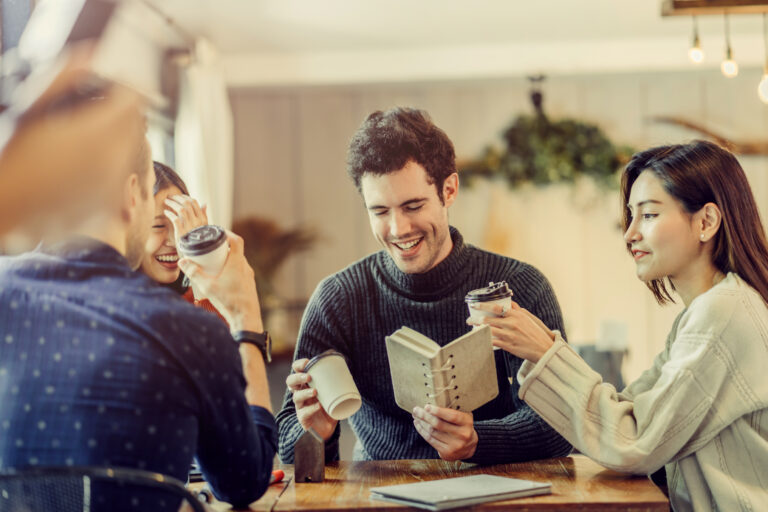 mix asian woman caucasian men People Meeting Friendship Togetherness and happiness enjoy at Coffee Shop Concept casual relax moment